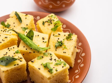 gujarati-khaman-dhokla-made-using-chana-dal-served-with-green-chutney-selective-focus(1) gujarati-khaman-dhokla-made-using-chana-dal-served-with-green-chutney-selective-focus(1)