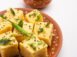 gujarati-khaman-dhokla-made-using-chana-dal-served-with-green-chutney-selective-focus(1)