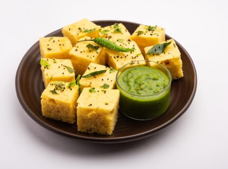 gujarati-khaman-dhokla-made-using-chana-dal-served-with-green-chutney-selective-focus(3) gujarati-khaman-dhokla-made-using-chana-dal-served-with-green-chutney-selective-focus(3)