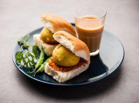 vada-pav-wada-pao-is-indian-desi-burger-is-roadside-fast-food-dish-from-maharashtra-selective-focus(2) vada-pav-wada-pao-is-indian-desi-burger-is-roadside-fast-food-dish-from-maharashtra-selective-focus(2)