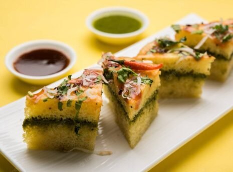 yellow-sandwich-dhokla-is-indian-savoury-snack-made-chick-pea-flour-rice-flour-originated-gujarat-served-with-green-tamarind-chutney-selective-focus_466689-58647 yellow-sandwich-dhokla-is-indian-savoury-snack-made-chick-pea-flour-rice-flour-originated-gujarat-served-with-green-tamarind-chutney-selective-focus_466689-58647